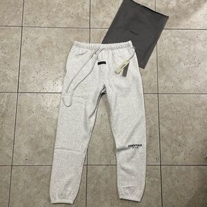 brand new light oat essentials pants
